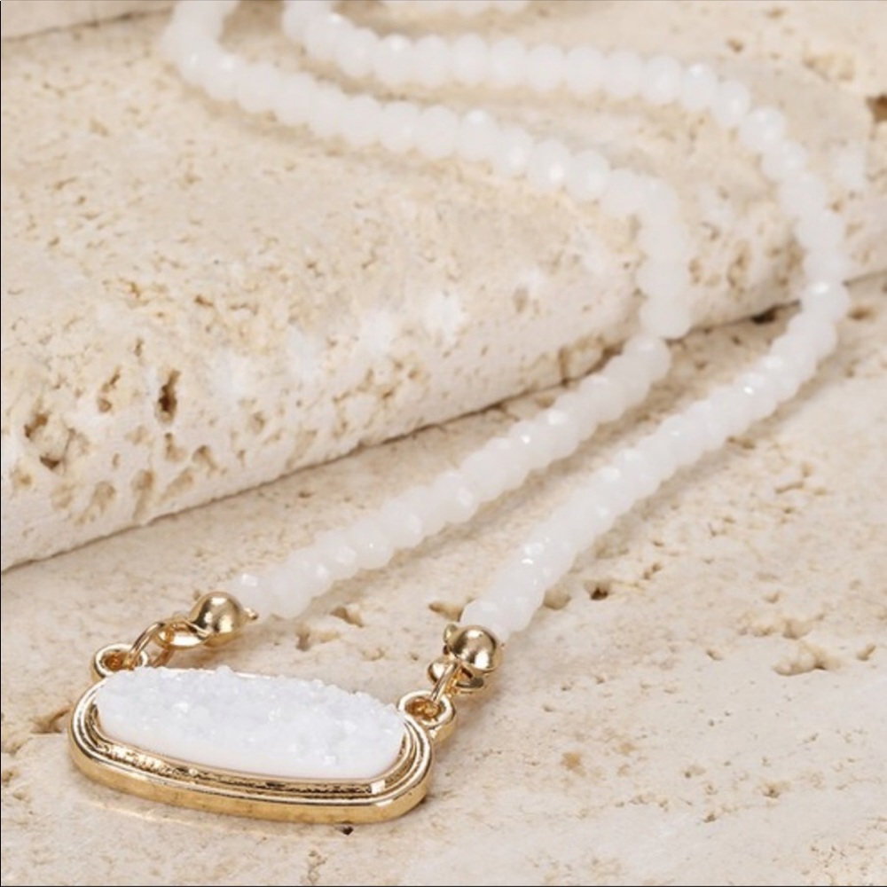 Set of white druzy necklace and gold earri…